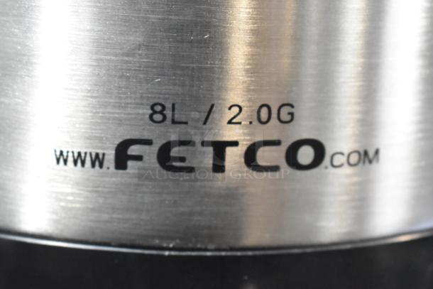 BRAND NEW SCRATCH AND DENT Fetco LGD-20 8L/2.0G stainless steel coffee dispenser with stand.