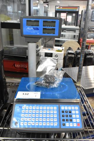 Brand new AvaTek 334PCS60T digital scale, 60 lb. capacity, with tower display, minor scratches and dents, model tag visible.