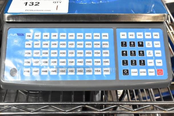 BRAND NEW AvaTek 334PCS60T 60 lb. digital price computing scale with tower, scratch and dent, keypad visible.