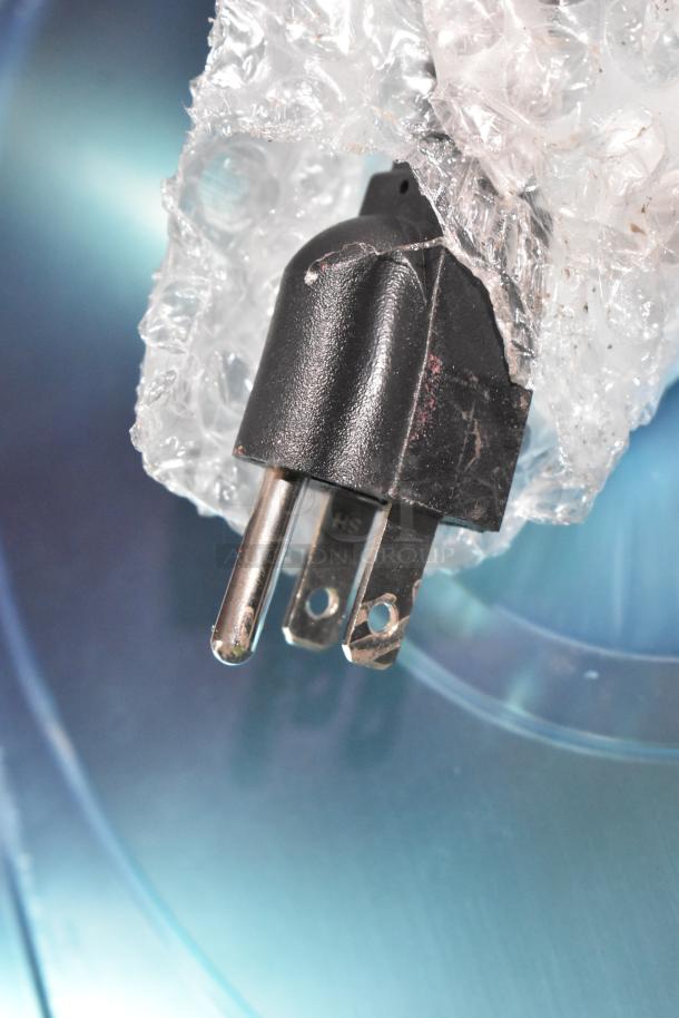 Close-up of the power plug wrapped in bubble wrap for the 2023 Avantco 177BMFW3 Bain Marie Buffet Food Warmer.