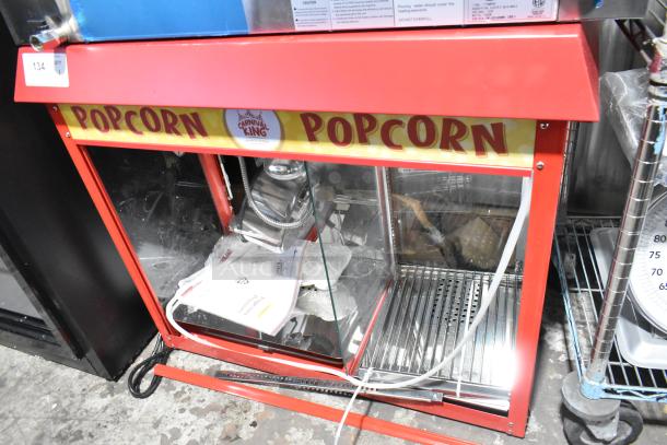 Carnival King Royalty Series 8 oz. popcorn machine, model 382PMW17R, with a broken back glass panel. 120V, 1 Phase.
