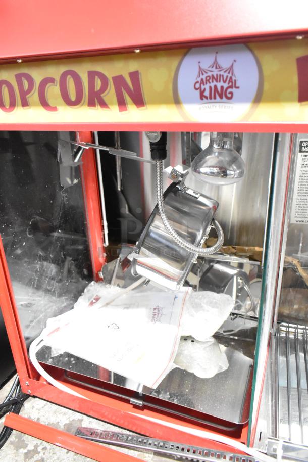 Carnival King 382PMW17R popcorn machine with warming merchandiser; broken back glass panel; 120V, 1-phase.