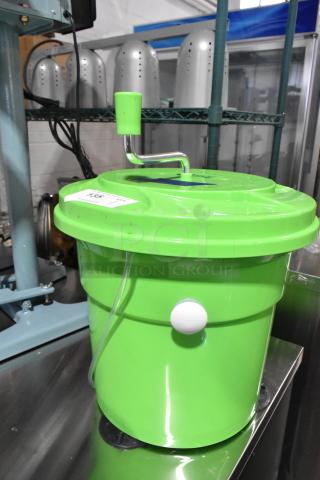 BRAND NEW Choice 176DRYER5GLB 5 Gallon Salad Spinner with Brake, green plastic, minor scratches visible on the surface.