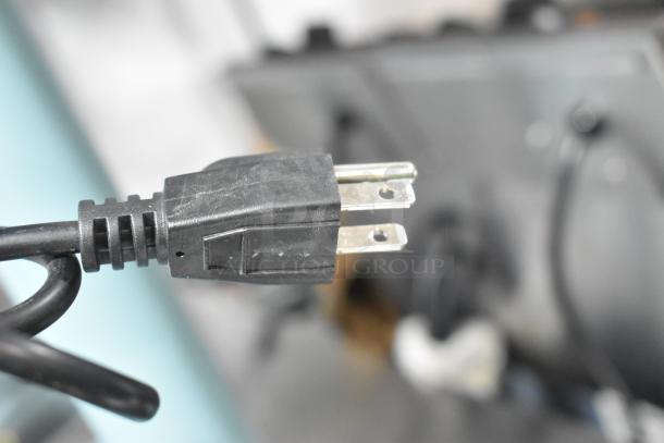 Close-up of a power plug for the Galaxy PFS-650 bag sealer, highlighting its 110V compatibility.
