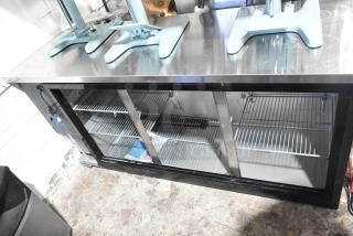 Brand new 2025 Avantco 73" back bar refrigerator, model 178UBB72SMC, black finish, missing doors, with LED lighting.