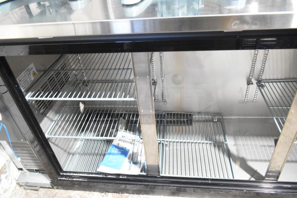 Brand new Avantco 178UBB72SMC back bar refrigerator, 73", black, missing doors, LED lighting, 115V, 1 phase, scratch and dent.