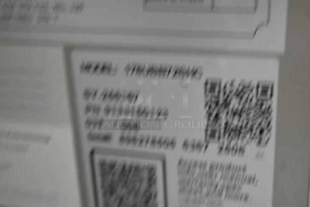 Blurred label showing model number 178UBB72SMC of Avantco refrigerator with QR codes.