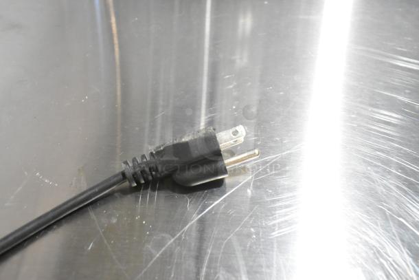 Power cord plug of the 2025 Galaxy FS-300M 12" Impulse Heat Bag Sealer. 110 Volts, 1 Phase. New, with cosmetic scratches.