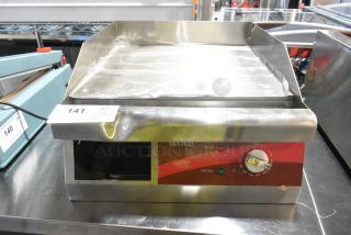 Brand new Avantco 177EG16N 16" stainless steel electric countertop griddle, 120V, 1 phase, with slight cosmetic damage.