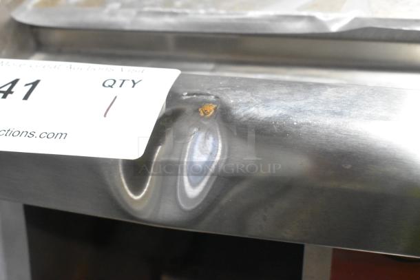 Brand new Avantco 177EG16N 16" stainless steel griddle with a visible scratch and dent. Electric, 120V, 1 phase.
