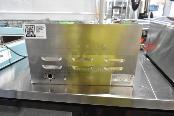 "Avantco 177EG16N 16-inch stainless steel electric countertop griddle, scratch and dent condition, 120 volts, 1 phase, brand new."
