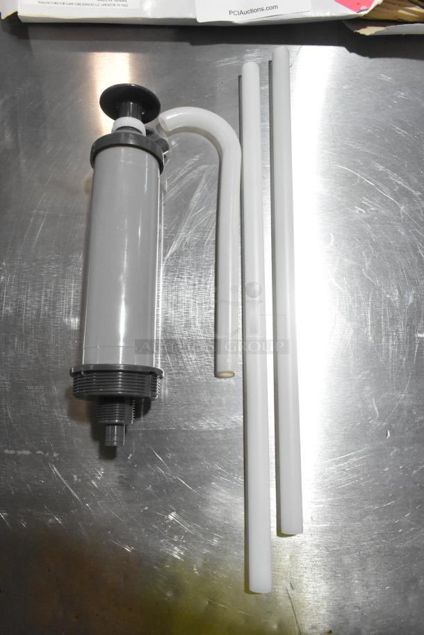 BRAND NEW SCRATCH AND DENT! 272CHEMPUMP Noble 2.5-55 Gallon Adjustable Pail Pump Dispenser with grey body and white tubes.
