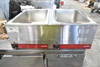 Brand new Avantco 177FW200D dual well electric food warmer, 12"x20", stainless steel, thermostatic controls, 120V, 1 phase.