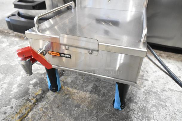 BRAND NEW 2024 Bunn SINGLE SH DBC Brewer with hot water dispenser, scratch and dent, stainless steel, warning label visible.