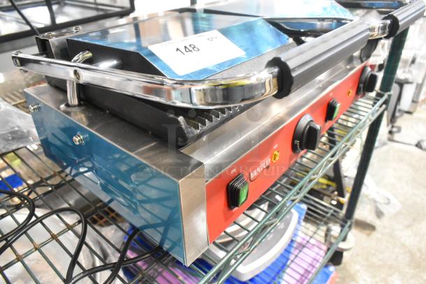 Brand new Avantco 177PG400 stainless steel dual Panini grill with grooved plates, 19 5/8" x 9 1/8" surface, 120V.