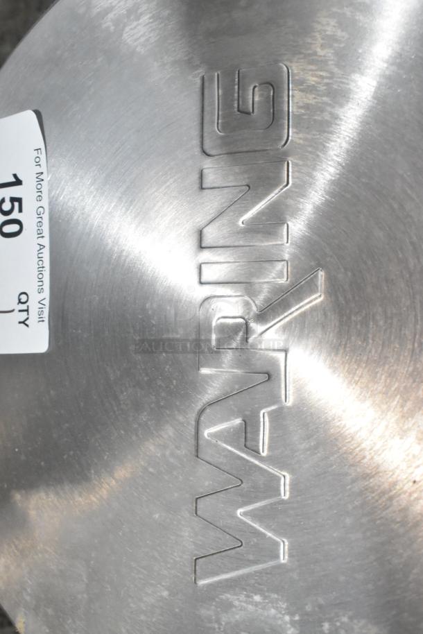 Brand new 2024 Waring WSC300 dual-surface electric cooktop. Features branding and auction tag for identification.