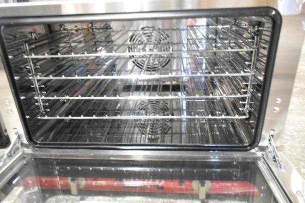 Avantco 177CO16 stainless steel countertop convection oven, 1.5 cu. ft., new, scratch and dent, 120V, interior racks visible.