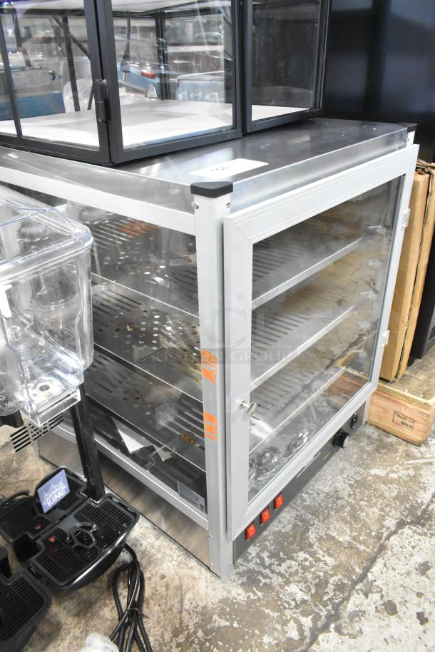 Brand new Carnival King 382HPW12D2S 12" full service warmer/merchandiser. Scratch and dent condition. 120 volts, 1 phase.