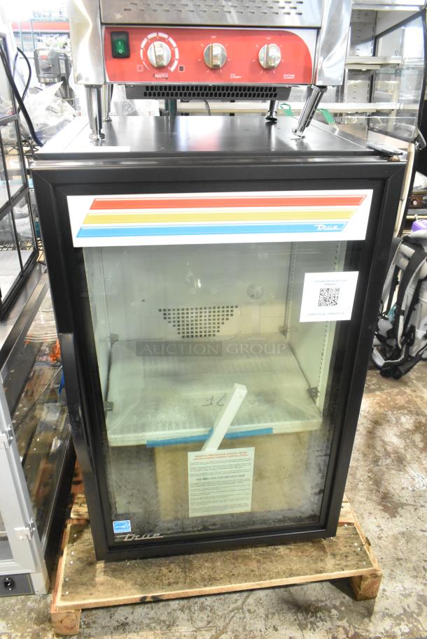 Brand new True GDM-07F-HC countertop merchandiser freezer, 24 1/8" black glass door, LED lighting, 115V, scratch and dent.