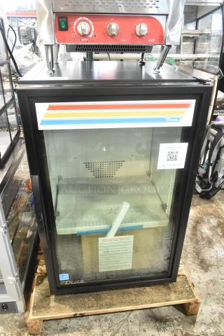 Brand new True GDM-07F-HC countertop merchandiser freezer, 24 1/8" black glass door, LED lighting, 115V, scratch and dent.