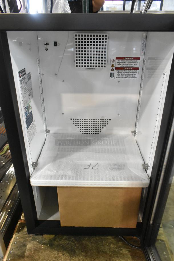 BRAND NEW 2025 True GDM-07F-HC countertop freezer, black, glass door, LED lighting, minor scratches, tags visible, 115V, 1 Phase.
