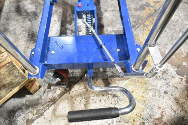 Brand new Vestil 32" x 19.5" blue steel hydraulic scissor lift cart with scale, 14"-38" lift, 500 lb capacity, model CART-500-SCL.