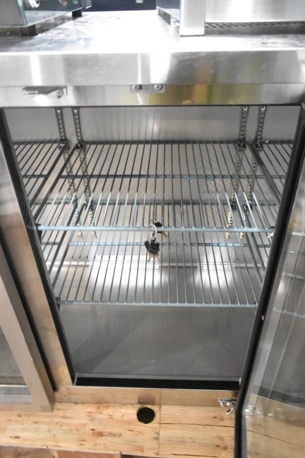 Brand new Avantco 3-door stainless steel back bar cooler merchandiser, 115V, 1 phase, with a lock and keys, scratch and dent condition.