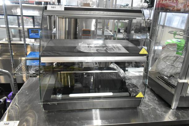 Brand new Avantco 177OAM2A 26" countertop merchandiser, black, with LED lighting, two shelves, minor scratches, 120V, 1 phase.
