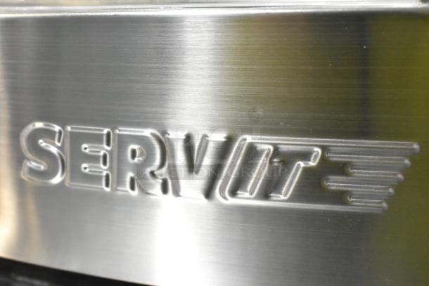 ServIt 423PDW12D2 stainless steel pizza warmer, 4-shelf rotating rack, brand new scratch and dent, embossed logo detail.