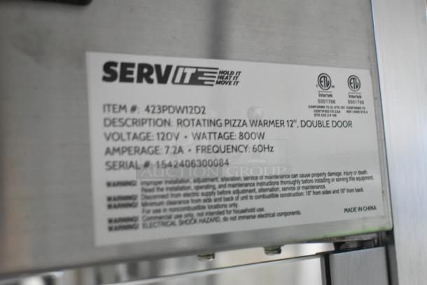 Label on ServIt 423PDW12D2 stainless steel 12" self-service pizza warmer. Features 4-shelf rotating rack, 120V, 1 phase.