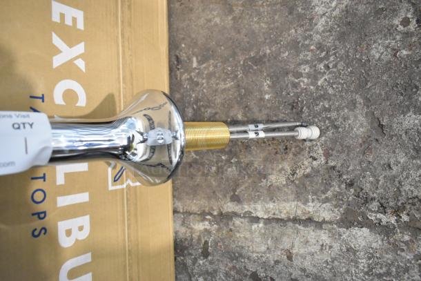 Brand new Blupure C2A stainless steel 2 tap beer tower with minor scratches, on cardboard surface.