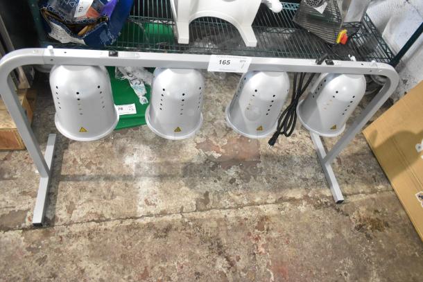 ServIt 423BLS4 heat lamp with 4 bulbs, silver suspension bar, scratch and dent condition, 120 volts, 1 phase.