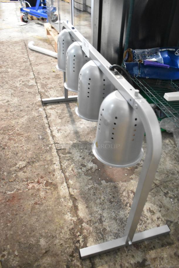 Brand new ServIt 423BLS4 4-bulb heat lamp with minor scratches and dents. 120V, 1 phase, durable construction.
