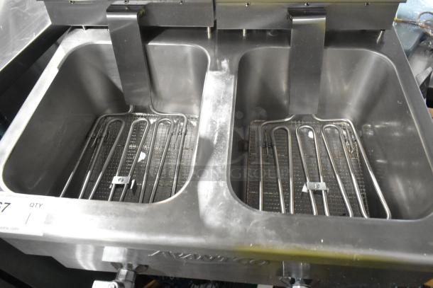 Brand new 2024 Avantco 177F202 30 lb. dual tank electric countertop fryer, medium-duty, 208-240V, 1 phase, with minor scratches and dents.