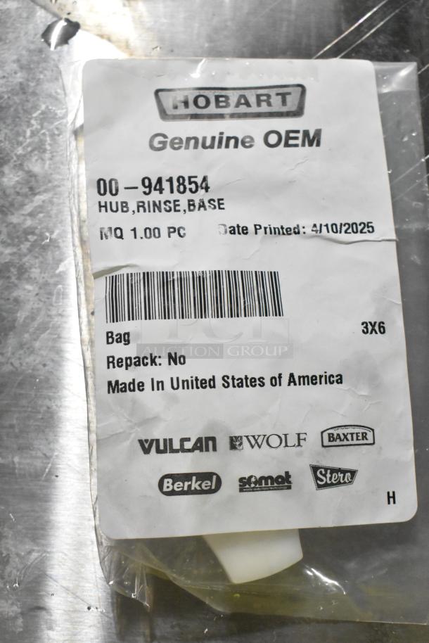 Hobart 00-941854 Hub Rinse Base in unopened packaging, labeled Genuine OEM, made in USA.