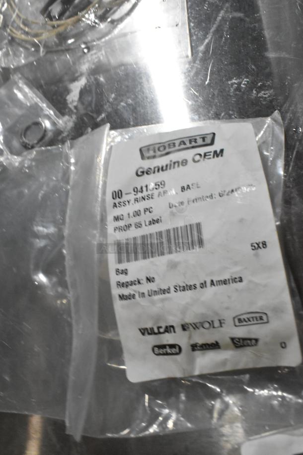 Plastic package with Hobart Genuine OEM label, indicating an assembly rinse arm base, model 00-941859, made in USA.