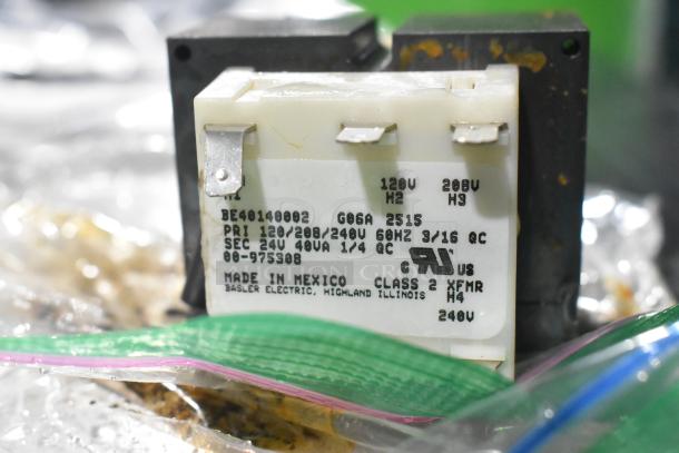 Auction image of 5 brand new Hobart parts, including 00-941854 Hub Rinse Base and 00-941859 Rinse Arm Assembly. Labels indicate model, voltage, and origin.