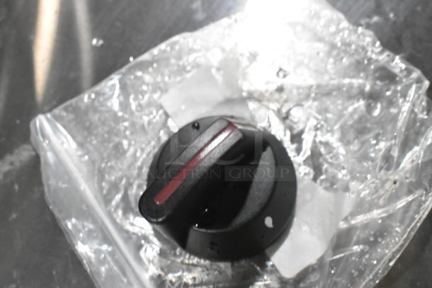 Brand new Southbend T-Stat Knob HP1190573 in plastic wrap, black with red stripe, undamaged, ready for use.