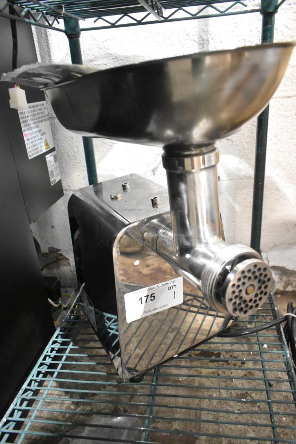 Brand new Vollrath MIN0012 #12 stainless steel meat grinder, 110V, 1 phase, with minor scratches and a dent.