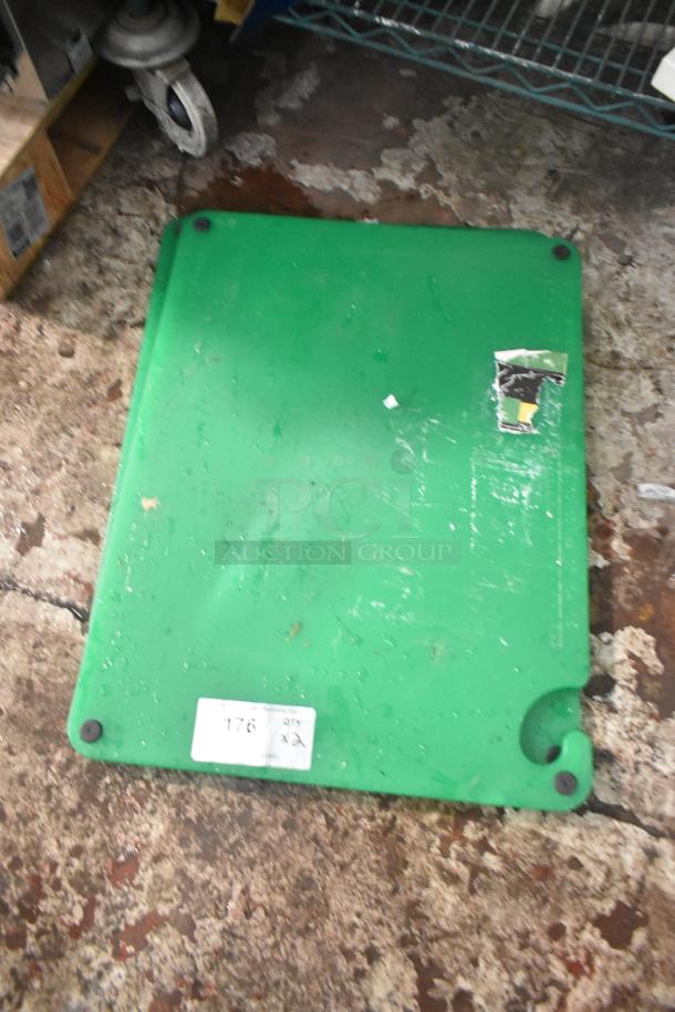 Brand new Choice 407CBG2418GN 24"x18" green cutting board with grips, hook, rulers; slight scratches visible, with labels.