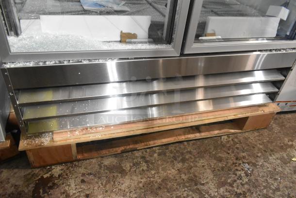 Brand new Avantco 178A49RGHC stainless steel 2-door reach-in cooler, scratch and dent, glass damage visible.