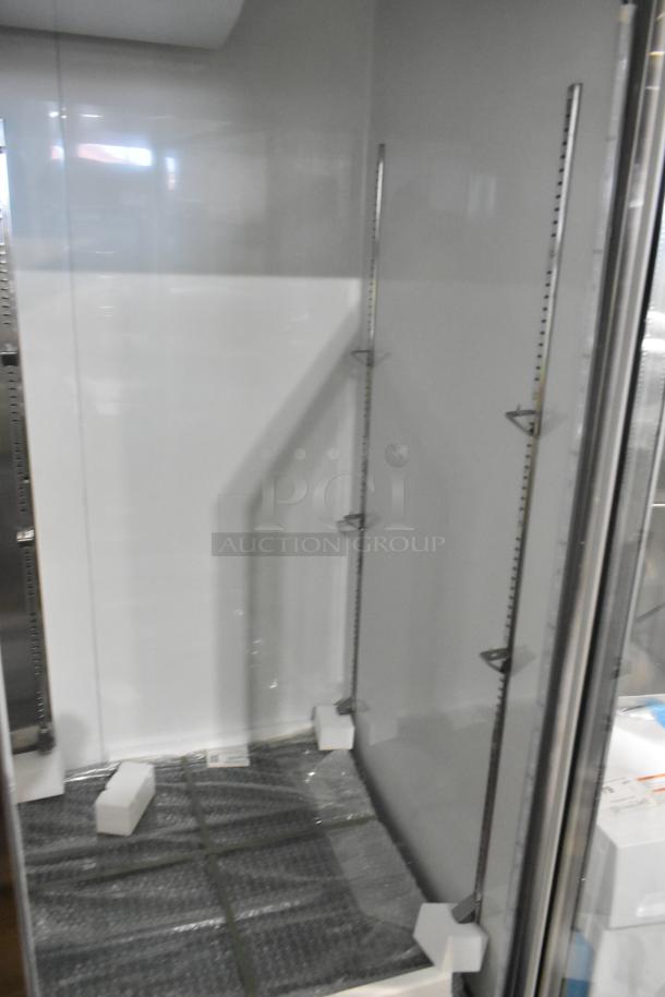 Brand new Avantco 178A49RGHC stainless steel 2-door cooler merchandiser, visible glass damage, 115 volts, 1 phase.