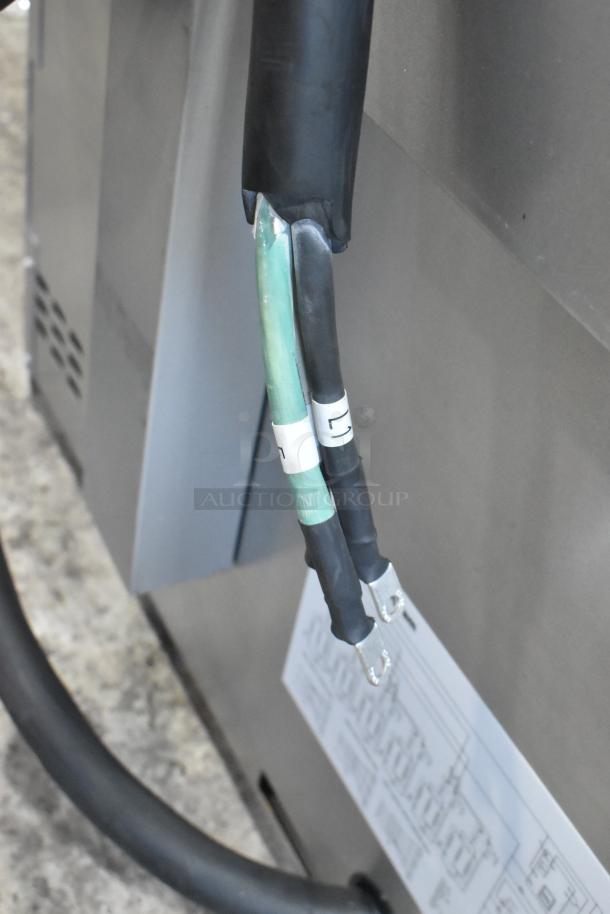 Close-up of electrical wiring for a 2024 Cooking Performance Group CPG 351ER36SD electric range, showing labeled cables.