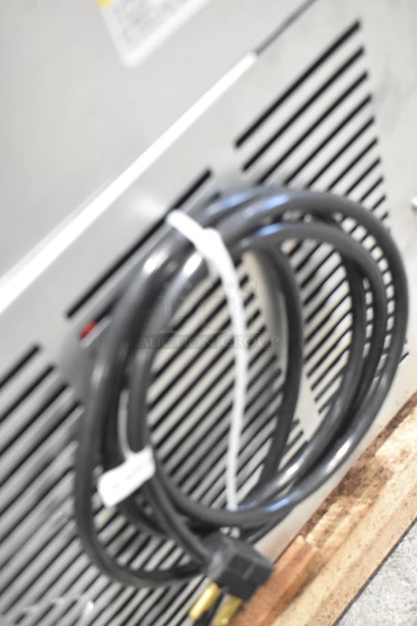 BRAND NEW Beverage Air WTF67AHC commercial freezer; visible power cord, 115V, 1 phase, stainless steel, scratch and dent condition.