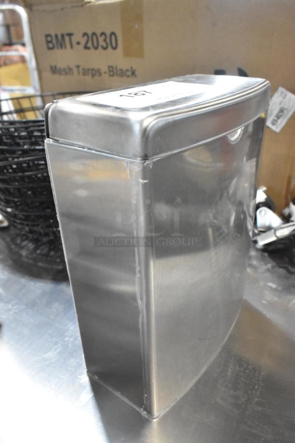 BRAND NEW SCRATCH AND DENT! Bobrick stainless steel bathroom trash can with visible dents. Model BMT-2030 on label.