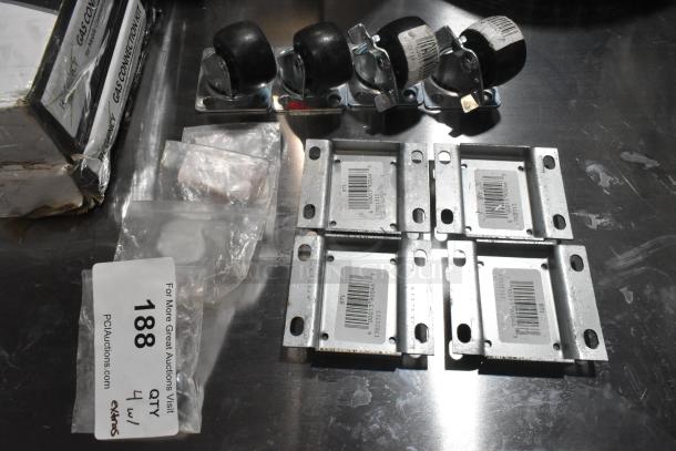 Lot of various items including 4 brand new commercial casters and mounting plates. Some items have scratches or dents. Tags show labels with barcodes.
