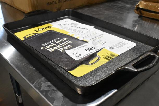 Lodge 15.5" x 10.5" pre-seasoned cast iron baking pan, model 530BW15BP, new with tags, scratch and dent condition.