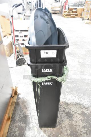 Brand new Lavex 475WH23BK 23-gallon black slim trash can, includes lid. Stack of four. Auction label visible.