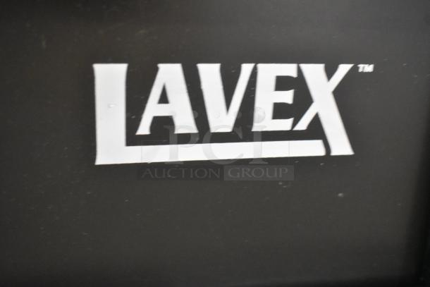 Lavex 475WH23BK 23 Gallon Black Slim Trash Can, new condition with minor scratches and dents, branding visible.