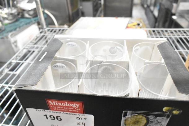 Box of 6 Luigi Bormioli Diamante Hi Ball Glasses, new condition, labeled “Mixology,” scratch and dent noted.